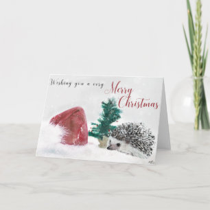 Festiva Hedgehog en la tarjeta de Navidades de nieve