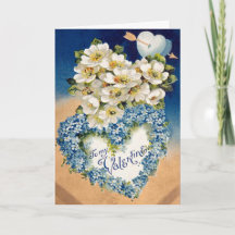 Hermosas flores de época aprecian la tarjeta de Sa