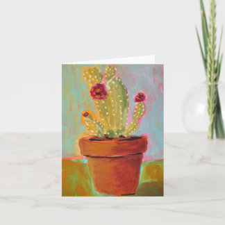 Festiva Navidades Cactus en una tarjeta de saludo en blanc