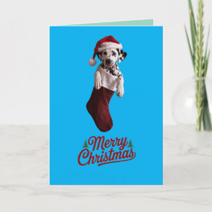 Festiva Navidades dálmatas sostienen tarjeta de vacaciones