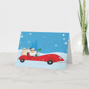 Festiva Santa que conduce una tarjeta de felicitación del