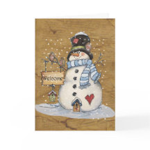 Snowman de arte popular en tarjeta de felicitación