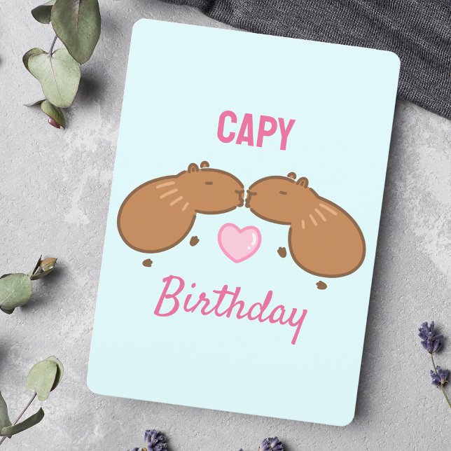 Festiva Tarjeta de cumpleaños de la pareja de Capybara de  (Wishing a happy birthday with animal pun art featuring two kissing capybaras and love.)