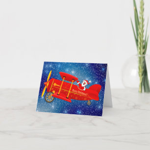 Festiva Tarjeta de felicitación para Navidades de biplano