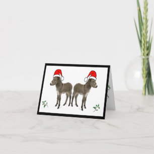 Festiva Tarjeta de navidades con holly y burro