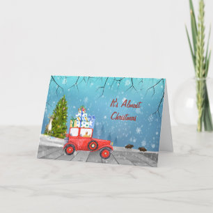 Festiva Tarjeta de navidades con viejo coche retro y escen