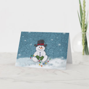 Festiva Tarjeta de Navidades de Snowman sentando
