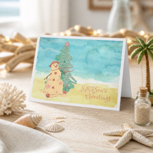 Festiva Tarjeta de vacaciones de playa con muñeco de nieve