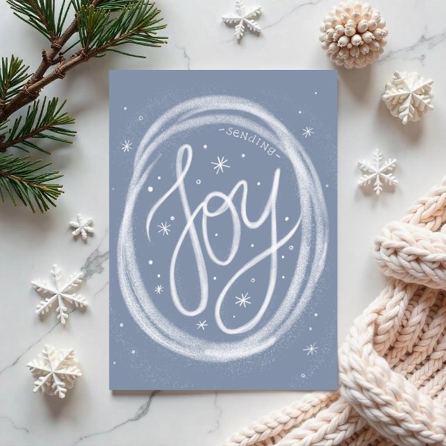 Festiva Tarjeta de vacaciones plegada de letra a mano - No ("Joy"- a hand-lettered forward holiday card surrounded by swirling snow. By Clearlytangled Studio.)