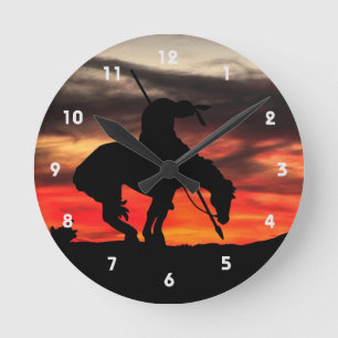 Fin del reloj de pared de silueta de rastro