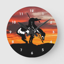 Fin del reloj de pared de silueta de rastro
