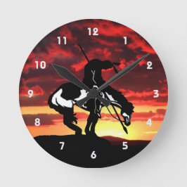 Fin del reloj de pared de silueta de rastro