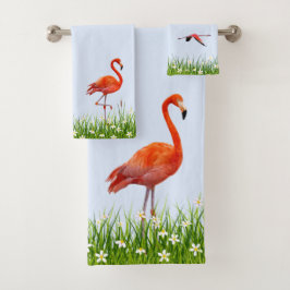Flamingo rosa y pradera con flores en azul claro