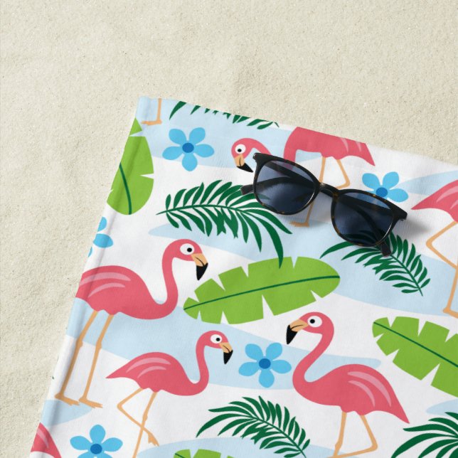 Flamingos en la toalla de playa de Paradise (In situ)