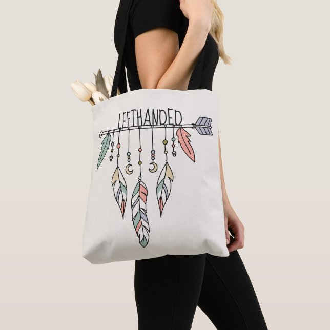 Flecha bohemia y plumas para la bolsa de la tota (Detalle)