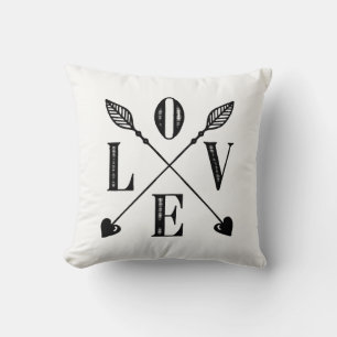 Flechas de amor almohada blanca y negra