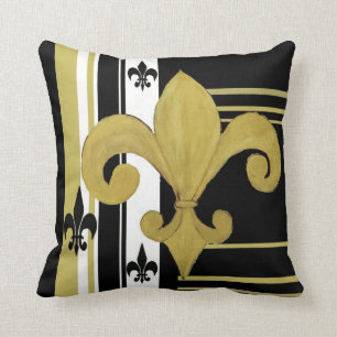 Fleur de lis almohada negra y dorada lanzada por e