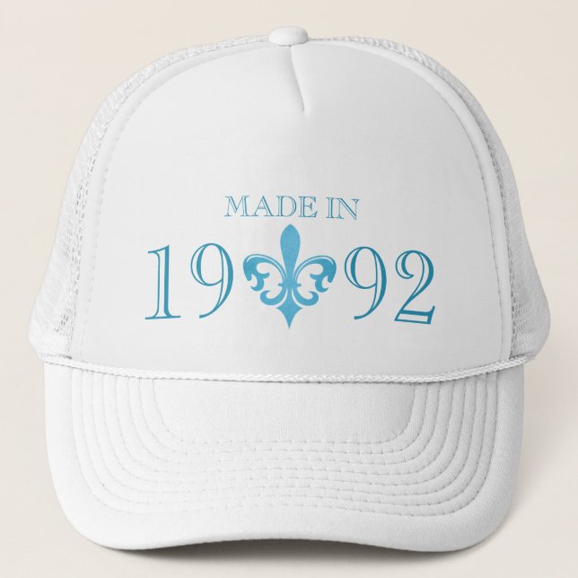 Fleur de lis edad auténtica hecha en gorra azul (Anverso)
