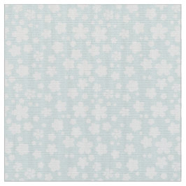 Flor blanca pequeña en tela azul