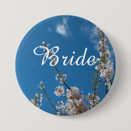 flor de cerezo en el botón azul del boda de novia.