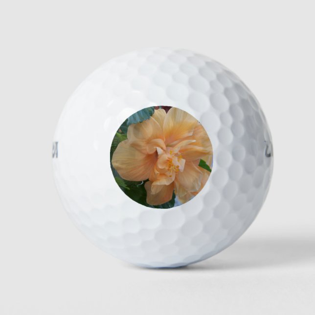 Flor de hibisco naranja en una bola de golf (Anverso)