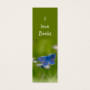 Flor de jardín de mariposas azules de los libros d