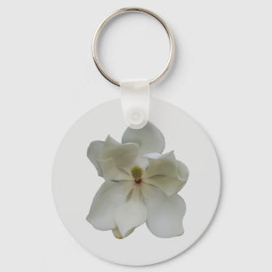 Flor de magnolia blanca en una llavero