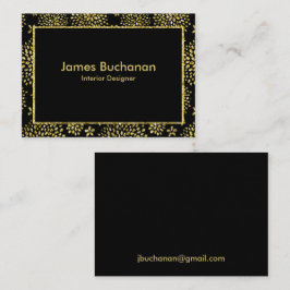 Flor dorada en tarjeta de visita negra