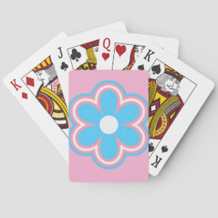 flor trans en fondo rosa en cartas de juego