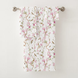 Floral-patterned towels hang neatly