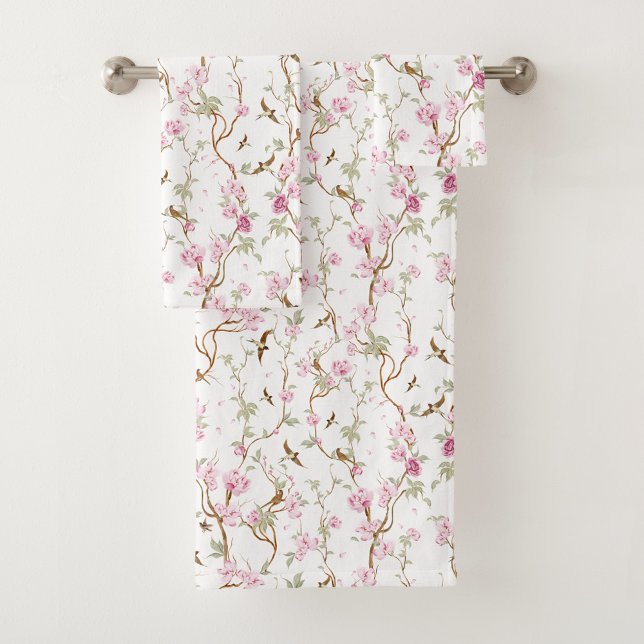 Floral-patterned towels hang neatly (Subido por el creador)