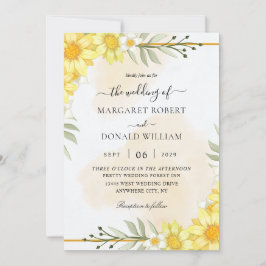 Flores amarillas con invitaciones de boda doradas