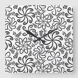 Flores blancas y negras fundidas Reloj de pared