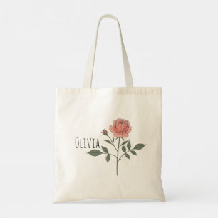 Flores cortas y elegantes en la bolsa de la tote