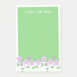 Flores de Lilac y notas verdes post-it