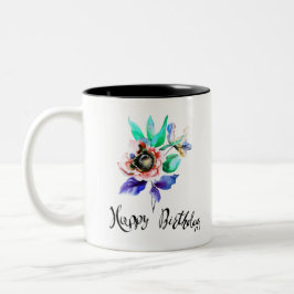Flores de primavera de cumpleaños con taza de acua
