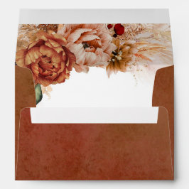Flores de roya de terracota y gramíneas de pampas
