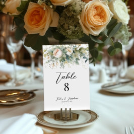 Flores elegantes y verdes números de mesa bodas