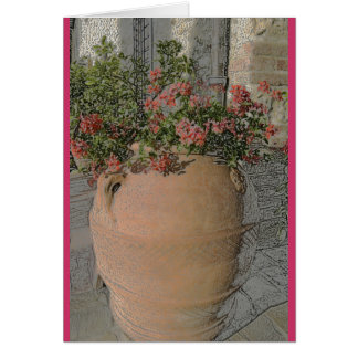 Flores en plantador toscano de terracota