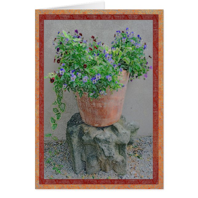 Flores en un pote de la terracota en roca (Frente)
