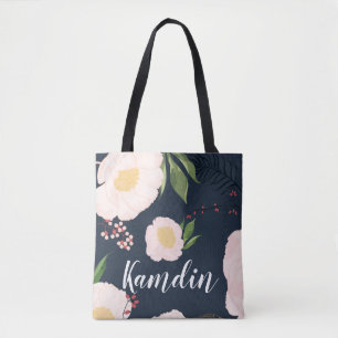 Flores florales blancas en la bolsa de la tota per