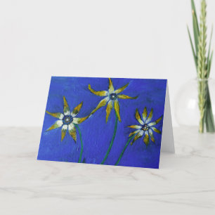 Flores pintando tarjeta de saludo de fondo azul