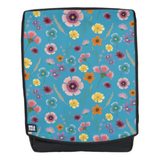 Flores praderas en la mochila azul