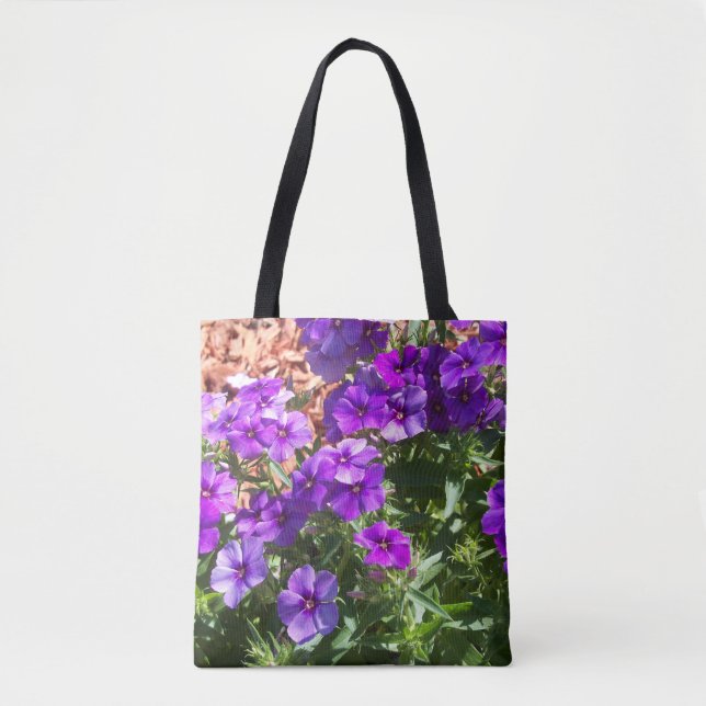 Flores púrpuras de Phlox en una bolsa de algodón (Anverso)
