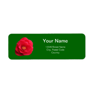 flores rojas de camelia etiqueta de dirección verd