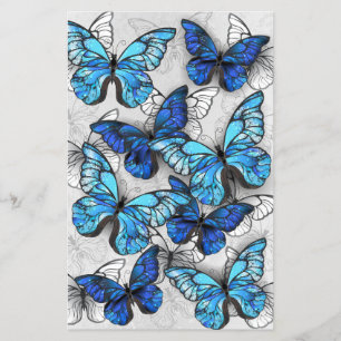 Flyer Composición de mariposas blancas y azules