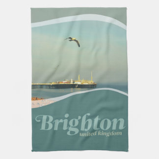 Flyin de gaviota en toalla de té de Brighton Pier