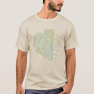 Follaje de Monstera en la camiseta verde suave