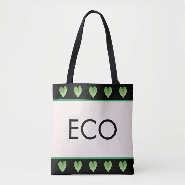 Forma verde del corazón en la bolsa de tote beige (Anverso)