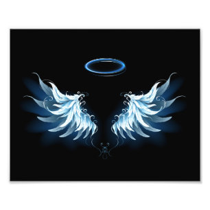 Foto Alas del Ángel Azul brillante sobre fondo negro